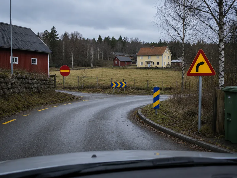 Hur kommer jag att köra säkert i svängen efter nedförsbacken?